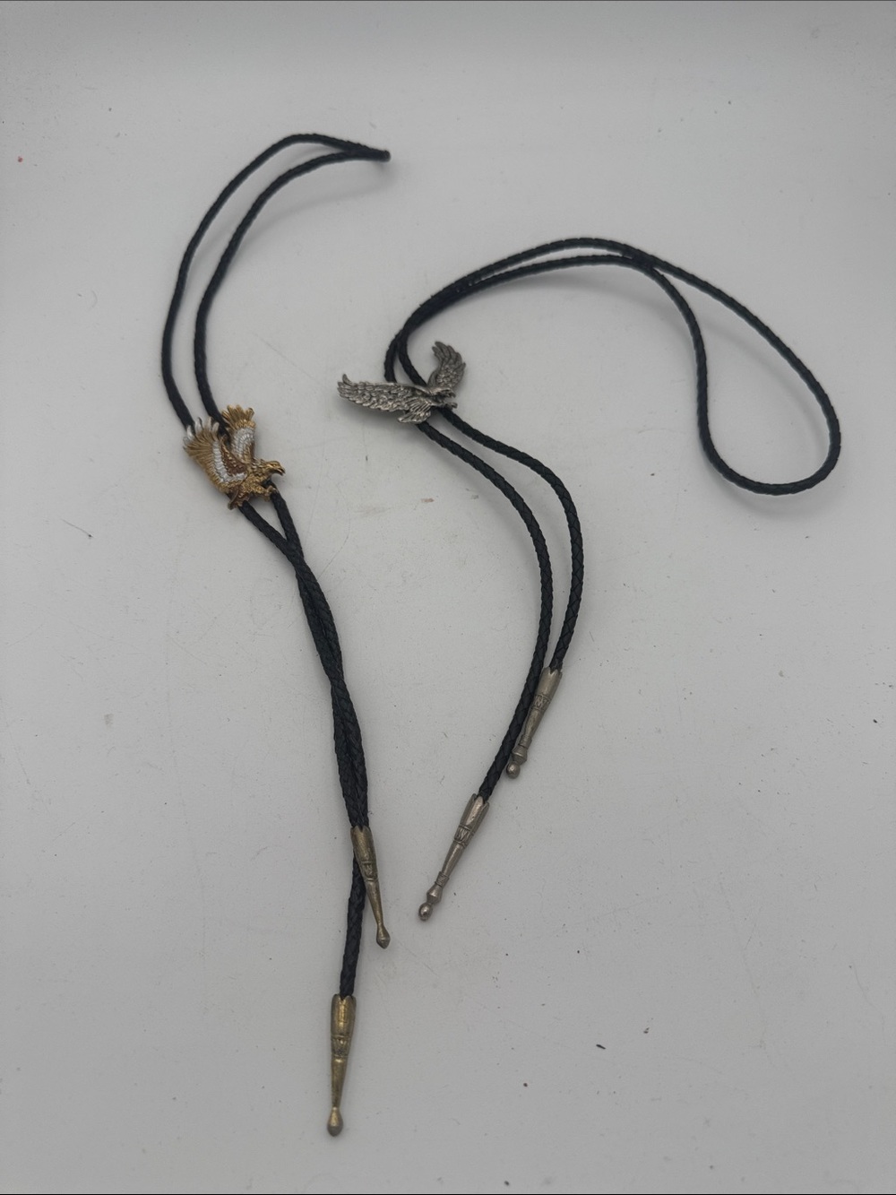 2 VTG American Bald Eagle western-style bolo ties, gold and silver tones